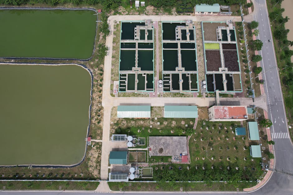 Bird's eye view of a water treatment facility in Hiệp Hòa, Bac Giang, Vietnam showing ponds and infrastructure.